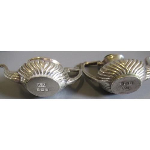 112 - A MINIATURE SILVER FIVE PIECE TEA AND COFFEE SERVICE by William Adams Ltd., Birmingham 1978, of semi... 