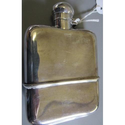 173 - A SILVER HIP FLASK by G & J W Hawksley, Sheffield 1931, of plain rounded oblong form with pull-off b... 