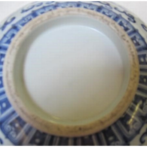 8 - A CHINESE PORCELAIN SHALLOW BOWL of plain circular form, the exterior painted in underglaze blue wit... 