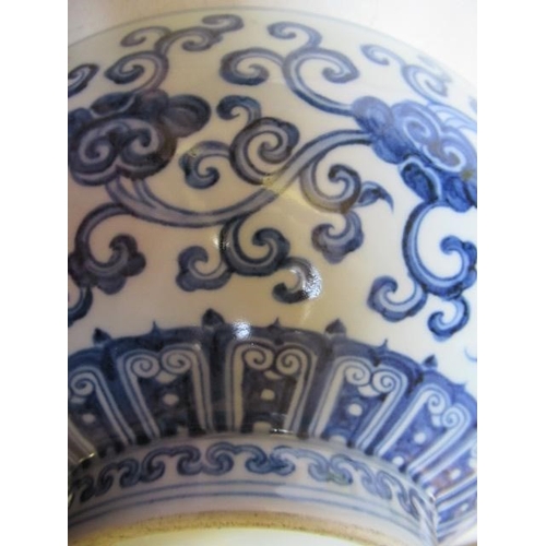 8 - A CHINESE PORCELAIN SHALLOW BOWL of plain circular form, the exterior painted in underglaze blue wit... 