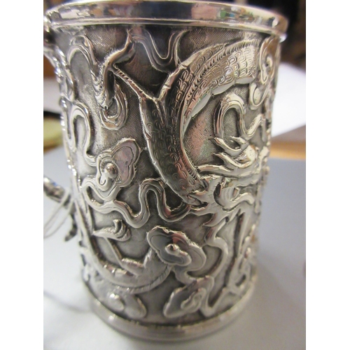 170 - A CHINESE EXPORT SILVER CHRISTENING MUG by Kwong Man Shing (act.1875-1925), of tapering cylindrical ... 