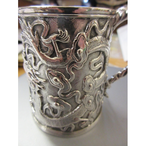 170 - A CHINESE EXPORT SILVER CHRISTENING MUG by Kwong Man Shing (act.1875-1925), of tapering cylindrical ... 