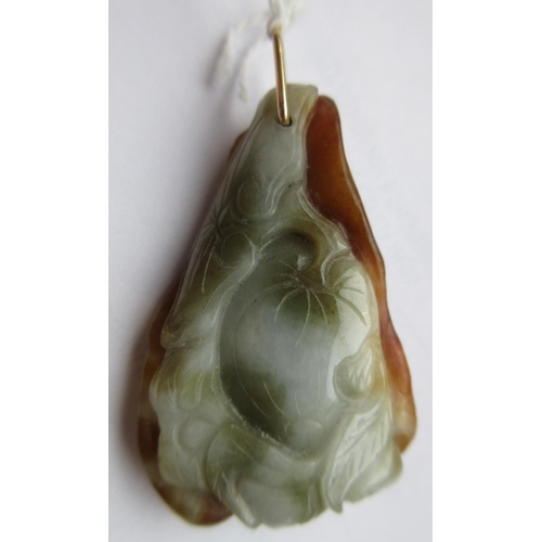 302 - A CHINESE JADE PENDANT, one side carved as a hare (?) beside a flower, the other with a persimmon, u... 