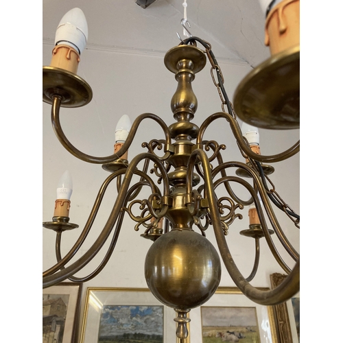 687 - AN IMPRESSIVE BRASS DUTCH STYLE CHANDELIER, 20th century, the baluster stem issuing thirty-six light... 