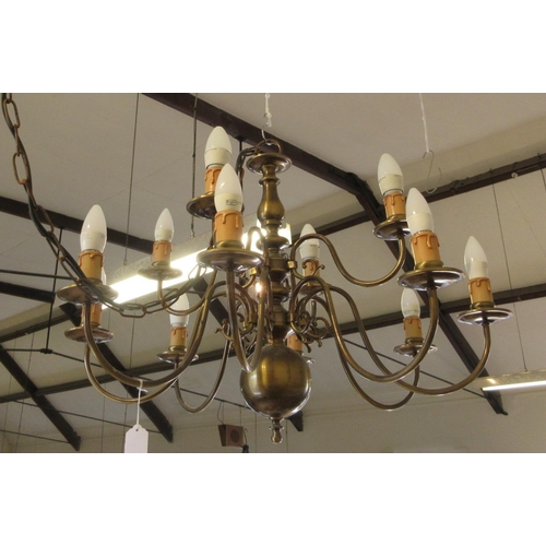 687 - AN IMPRESSIVE BRASS DUTCH STYLE CHANDELIER, 20th century, the baluster stem issuing thirty-six light... 