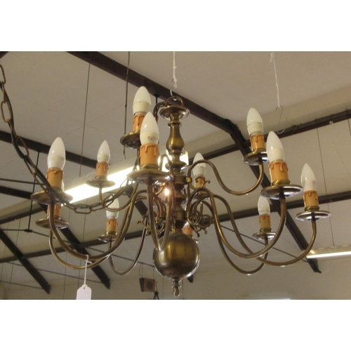 687 - AN IMPRESSIVE BRASS DUTCH STYLE CHANDELIER, 20th century, the baluster stem issuing thirty-six light... 