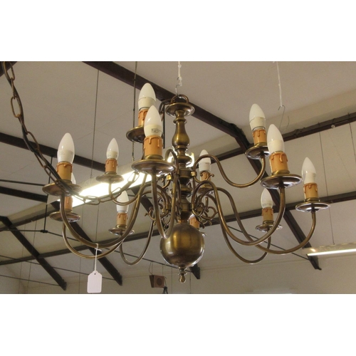 687 - AN IMPRESSIVE BRASS DUTCH STYLE CHANDELIER, 20th century, the baluster stem issuing thirty-six light... 