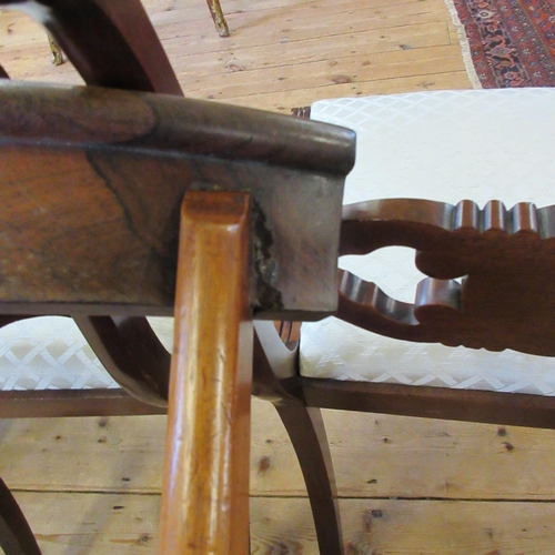 709 - A SET OF SIX EARLY VICTORIAN ROSEWOOD DINING CHAIRS, mid 19th century, the open back with curved top... 