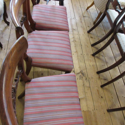 709 - A SET OF SIX EARLY VICTORIAN ROSEWOOD DINING CHAIRS, mid 19th century, the open back with curved top... 