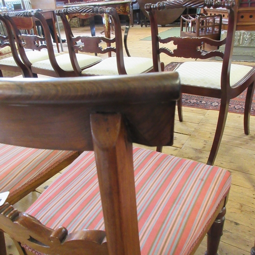 709 - A SET OF SIX EARLY VICTORIAN ROSEWOOD DINING CHAIRS, mid 19th century, the open back with curved top... 