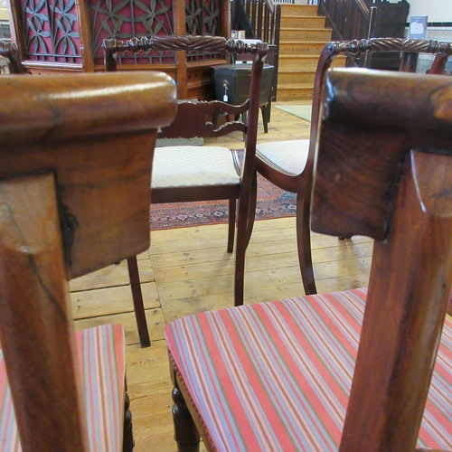 709 - A SET OF SIX EARLY VICTORIAN ROSEWOOD DINING CHAIRS, mid 19th century, the open back with curved top... 