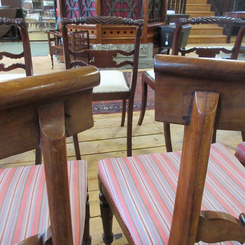 709 - A SET OF SIX EARLY VICTORIAN ROSEWOOD DINING CHAIRS, mid 19th century, the open back with curved top... 