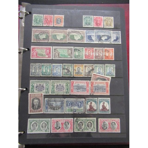 589 - ALBUM OF BRITISH OVERSEAS TERRITORIES STAMPS INCLUDING SARAWAK