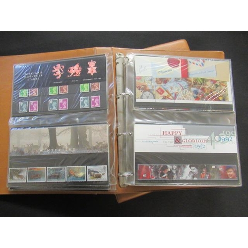 601 - TWO MINT ALBUMS OF DECIMAL PRESENTATION PACKS OF STAMPS INCLUDING £10 EXAMPLE