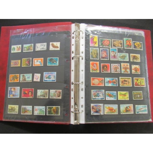 625 - TWO ALBUMS OF WORLD STAMPS INCLUDING KUWAIT AND NEW GUINEA EXAMPLES