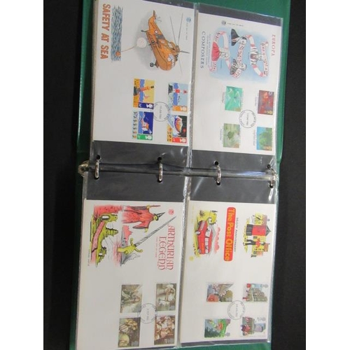 634 - GREEN ALBUM OF UK FIRST DAY COVERS