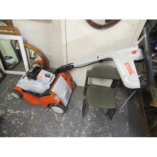 572 - STIHL CORDLESS LAWNMOWER AND CHARGER