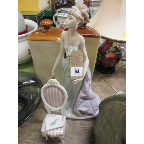 64 - LARGE LLADRO FIGURINE AND A CERAMIC CHAIR