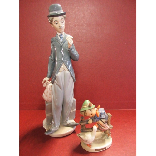 426 - LLADRO CHARLIE CHAPLIN PLUS GOEBEL BOY FIGURES