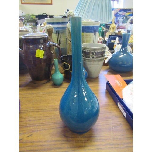 149 - FOUR BLUE GLAZED BOTTLE VASES