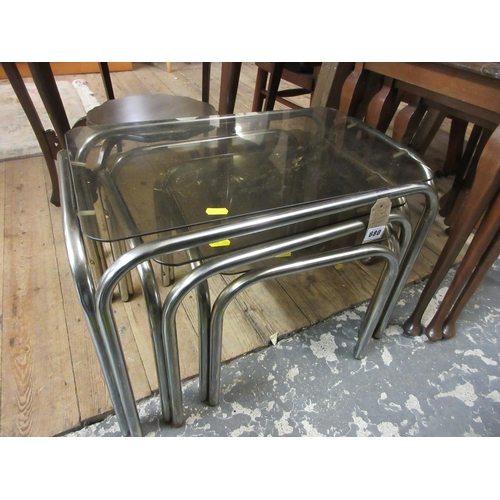 680 - NEST OF 1970S CHROME AND GLASS TABLES