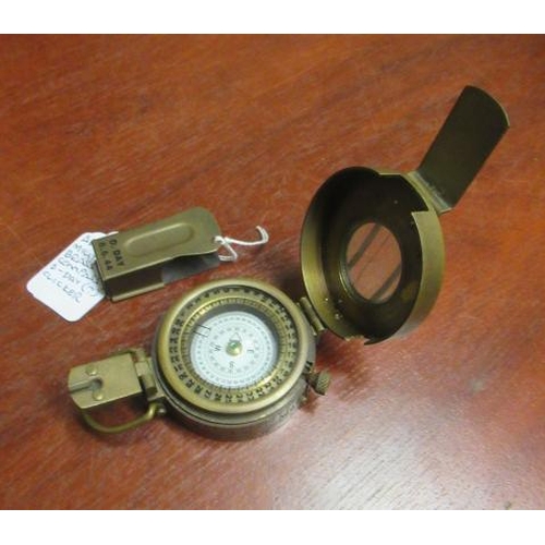 267 - MILITARY BRASS COMPASS WITH D-DAY ? CLICKER