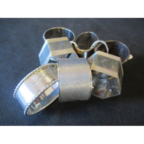 200 - SEVEN SILVER NAPKIN RINGS 283.7G