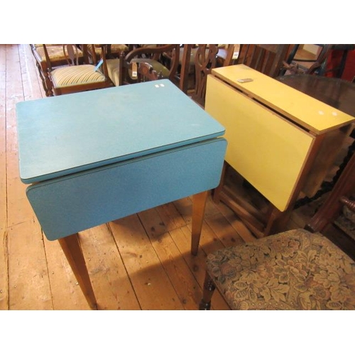 663 - ONE BLUE FORMICA TOPPED DROP LEAF KITCHEN TABLE AND A YELLOW DROP LEAF FORMICA TOPPED KITCHEN TABLE ... 