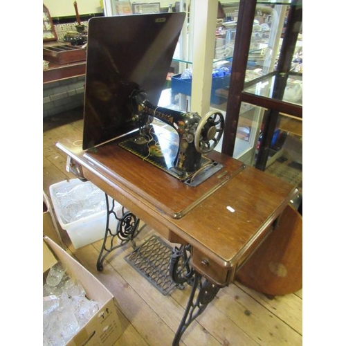 720 - SINGER TREADLE SEWING MACHINE