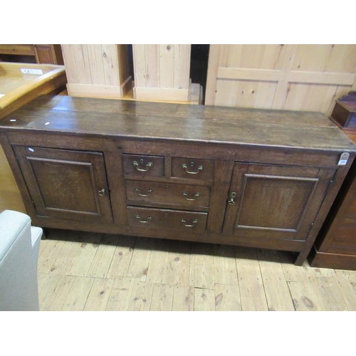 725 - OAK DRESSER BASE WITH FOUR DRAWERS