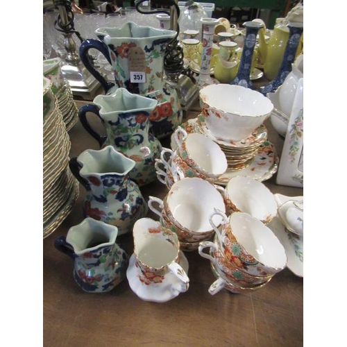 357 - FOUR GRADUATED IRONSTONE CHINA JUGS WITH IMPERIAL TEA SET