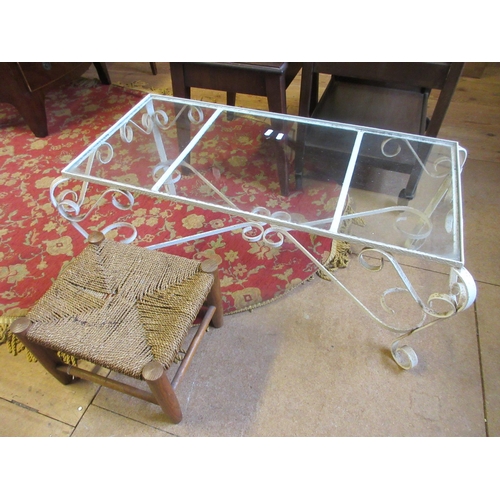 1099 - METAL AND GLASS COFFEE TABLE AND WICKER STOOL