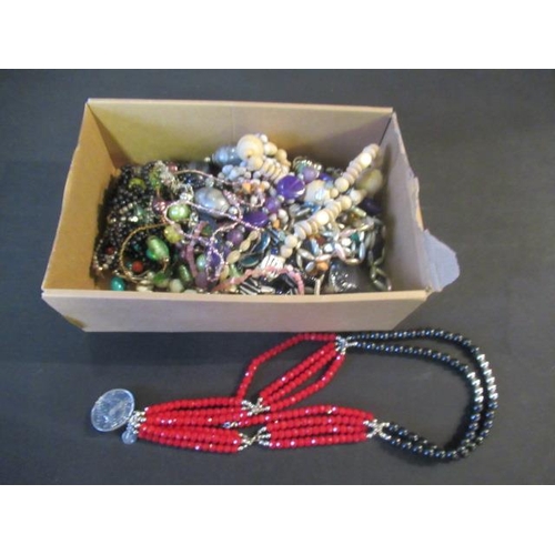 260 - BOX OF COSTUME JEWELLERY