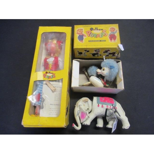 320 - TWO BOXED PELHAM PUPPETS AND A CLOCKWORK ELEPHANT