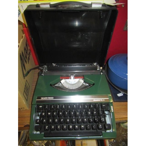 328 - SILVER REED CASED PORTABLE TYPEWRITER