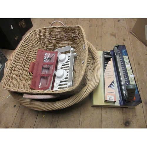 532 - TWO BASKETS WITH A COMB BINDING MACHINE ETC