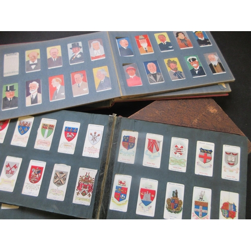 597 - THREE ALBUMS OF CIGARETTE CARDS