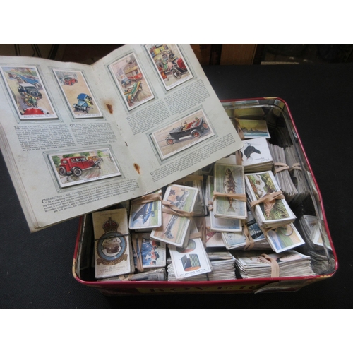 598 - TIN OF CIGARETTE CARDS