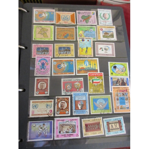 663 - TWO ALBUMS OF WORLD STAMPS INCLUDING KUWAIT EXAMPLES