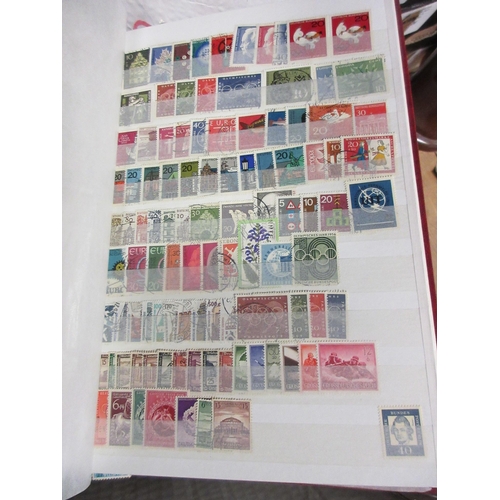 670 - EIGHT ALBUMS OF MINT AND USED UK AND WORLD STAMPS