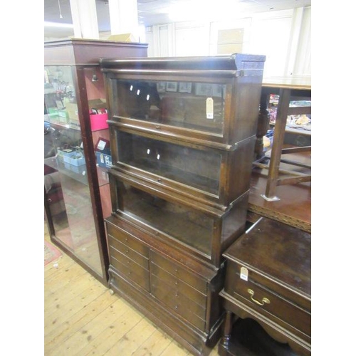 961 - GLOBE WERNICKE OAK BOOKCASE WITH BANK OF EIGHT DRAWERS BELOW