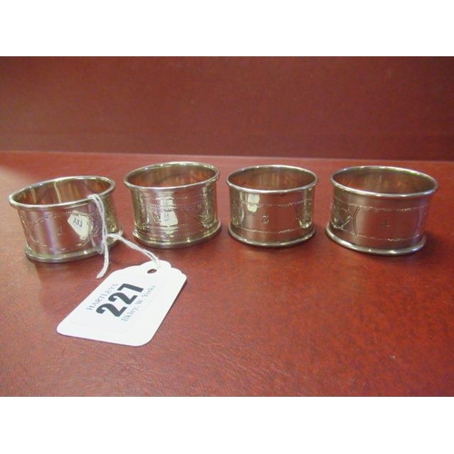 227 - FOUR SILVER NUMBERED NAPKIN RINGS