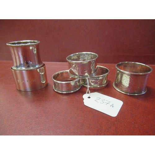 237A - SIX SILVER NAPKIN RINGS