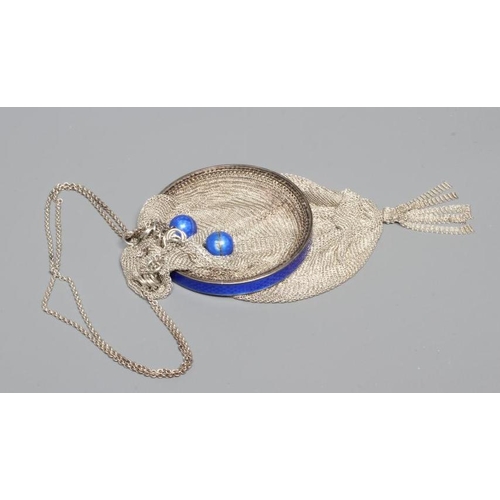 104 - AN ART DECO RETICULE, unmarked, the fine mesh bag with tassel and blue guilloche enamelled 'ring', t... 