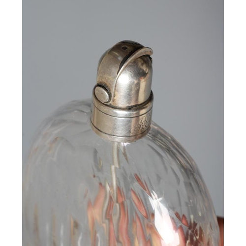 134 - A VICTORIAN SCENT FLASK by Thomas Johnson I, London 1875, the panel cut clear glass flattened oval f... 