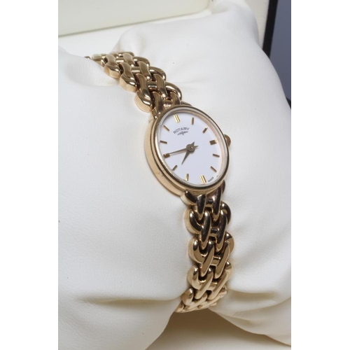 166 - A LADY'S 9CT GOLD ROTARY WRISTWATCH, the oval dial with applied metal batons, quartz movement, in a ... 