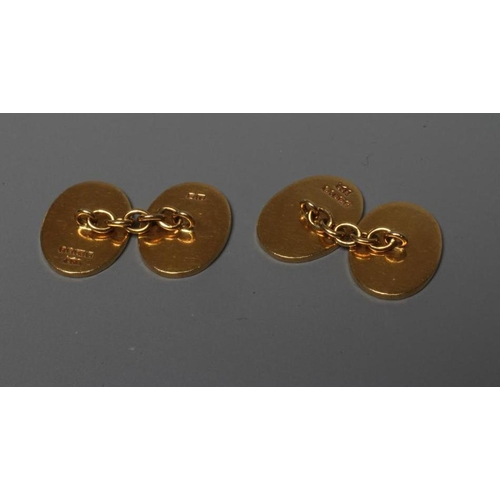 198 - A PAIR OF 18CT GOLD OVAL CUFFLINKS, engraved with initials and with engine turning, Birmingham 1960,... 