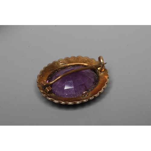 219 - A VICTORIAN AMETHYST BROOCH, the oval facet cut stone collet set to a border of seed pearls, with ap... 