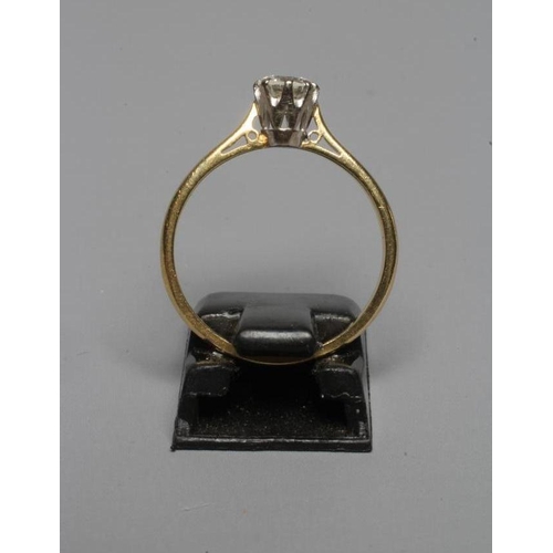 226 - A SOLITAIRE DIAMOND RING, the brilliant cut stone of approximately 0.30cts, claw set to a plain 18ct... 