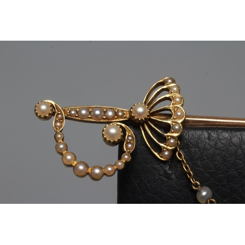 272 - AN EDWARDIAN NOVELTY JABOT PIN in the form of a court sword with seed pearl set basket hilt and quil... 